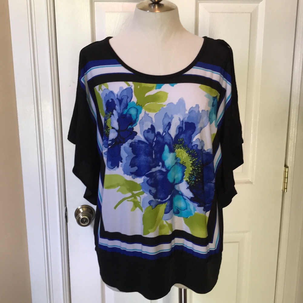 Bright floral colder shoulder knit top